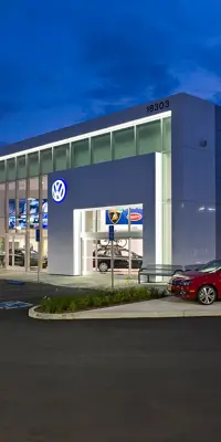 Volkswagon dealership at night